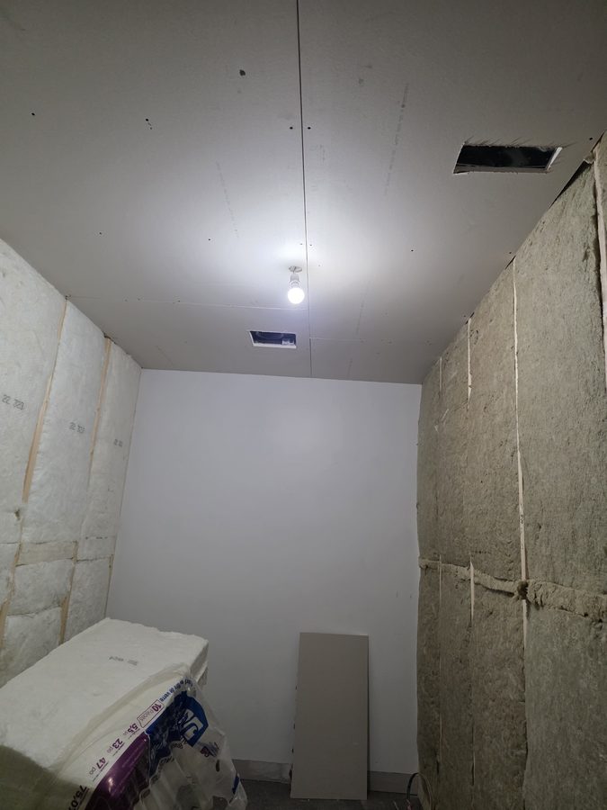 Chinook Glow drywall — service room ceiling complete with HVAC vent