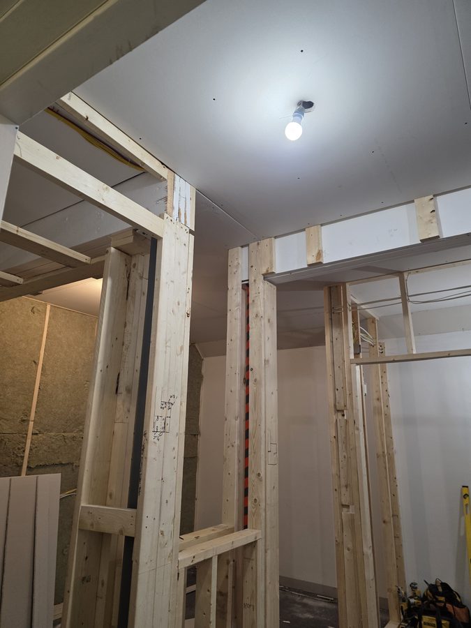 Chinook Glow drywall — service room ceiling with HVAC cassette