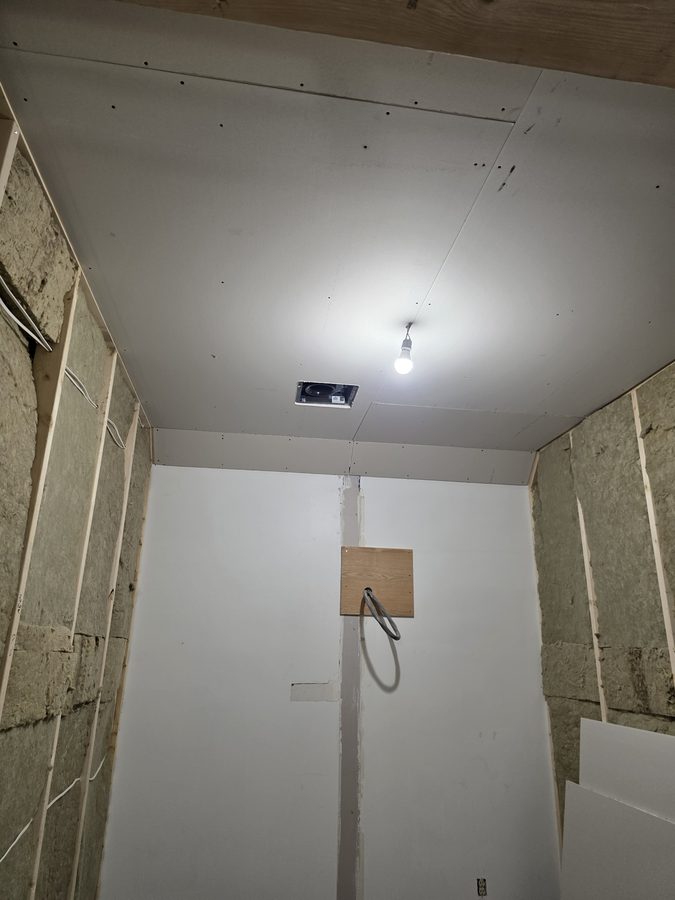 Chinook Glow drywall — service room nearly drywalled