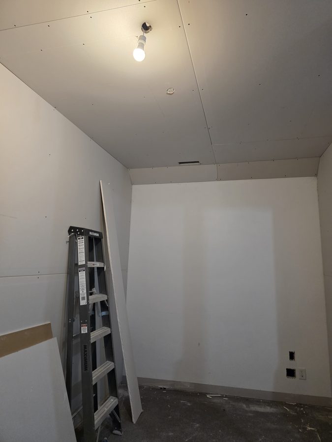 Chinook Glow drywall — service room fully enclosed with walls boarded