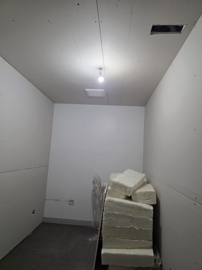 Chinook Glow drywall — service room walls and ceiling complete