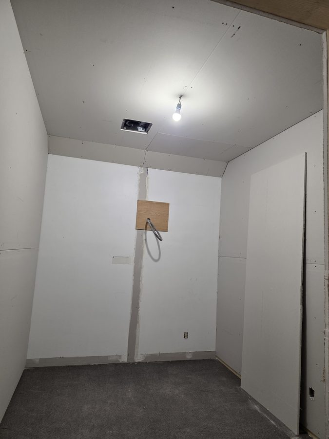 Chinook Glow drywall — service room enclosed with buck booster feed