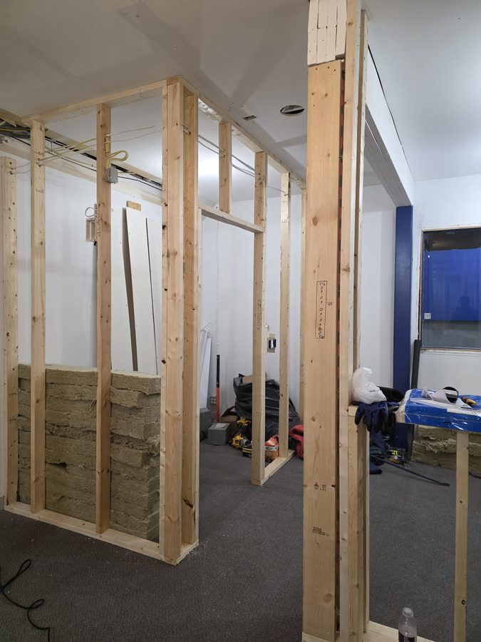 Chinook Glow electrical rough-in — insulation going in, service rooms defined
