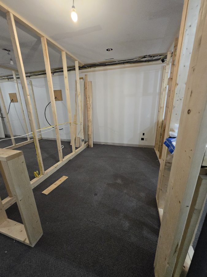 Chinook Glow framing — inside a service room looking toward electrical rough-in