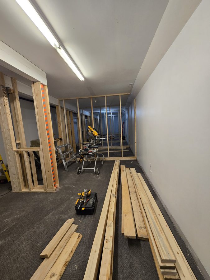 Chinook Glow framing — full length of service rooms from reception end