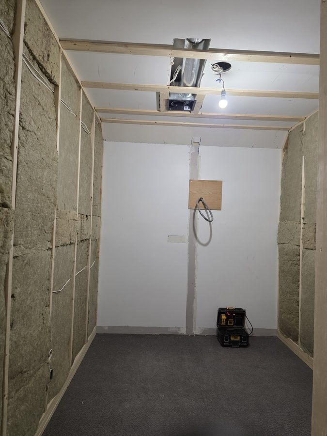 Chinook Glow HVAC — service room with cassette and batt insulation