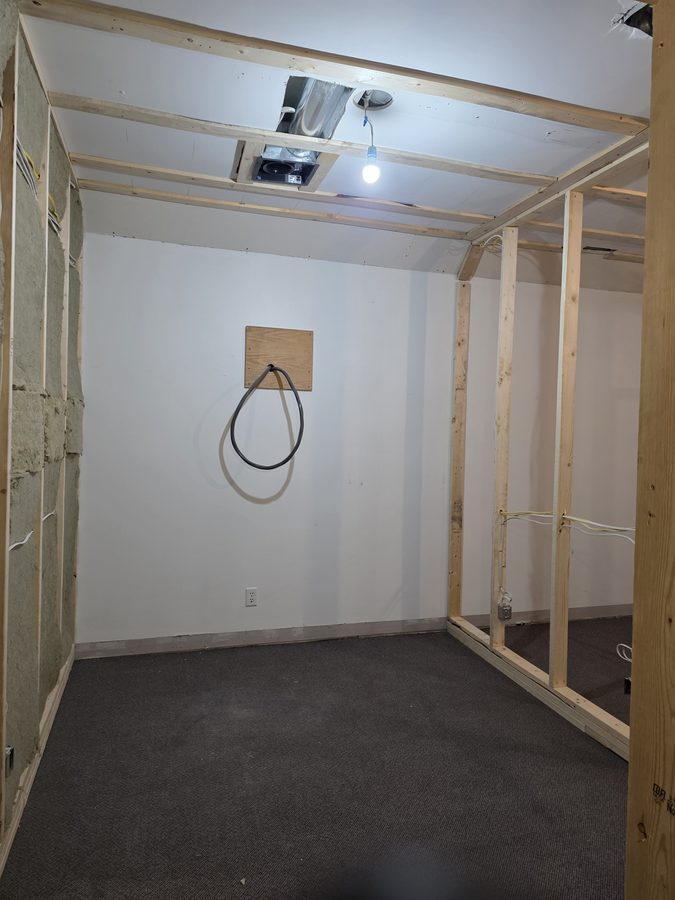 Chinook Glow insulation — service room walls with batt insulation