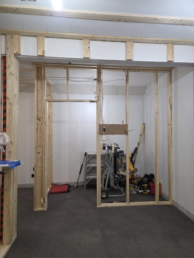 Chinook Glow insulation — corridor with drywall starting on left wall