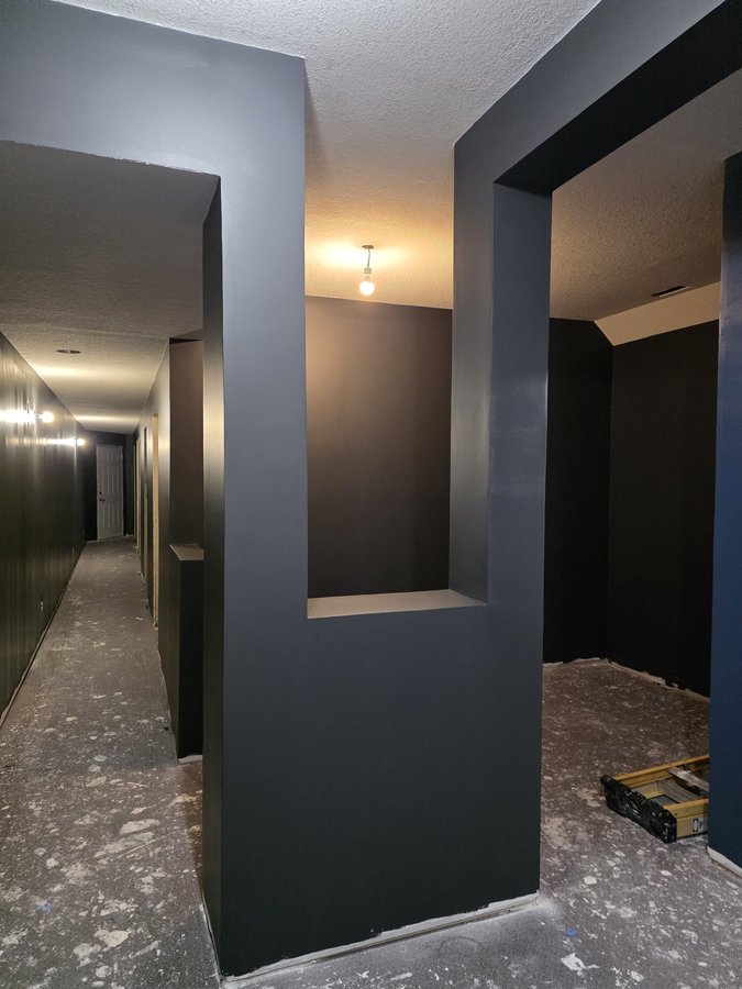 Chinook Glow paint — charcoal corridor with built-in display niche