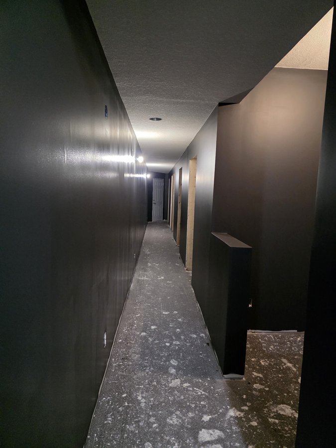 Chinook Glow paint — full corridor in charcoal