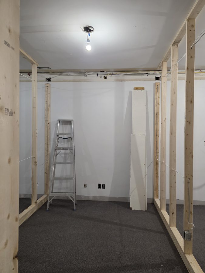 Infrared sauna room before — framed walls and electrical rough-in